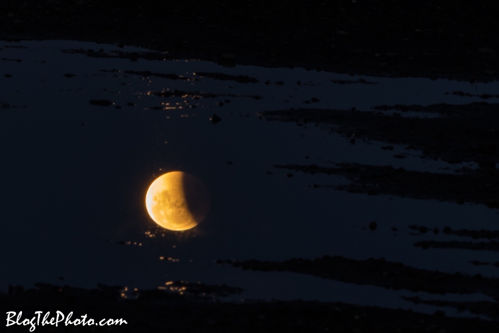 Reflection of lunar eclipse in water